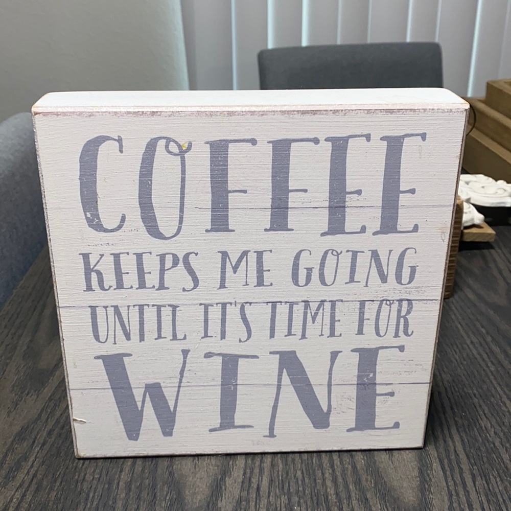 “Coffee keeps me going until…” sign